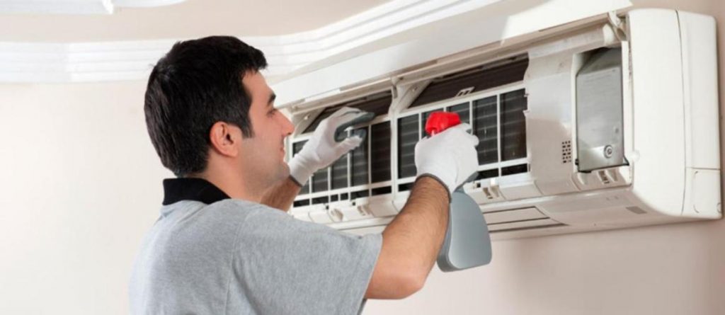 Person repairing Ac